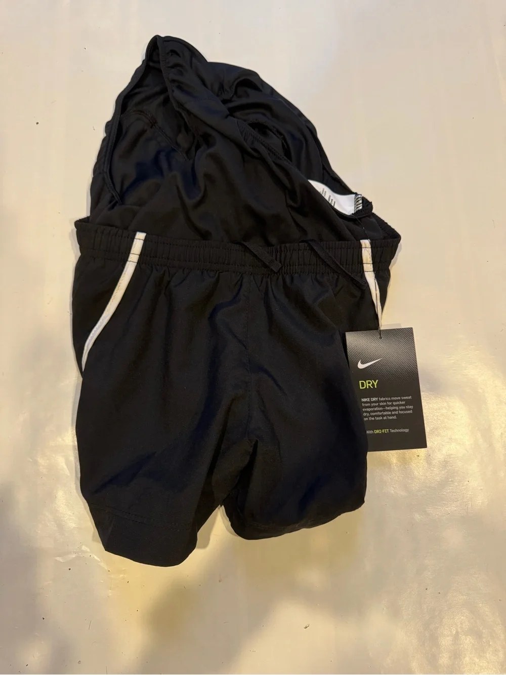 Nike Women’s Black Athletic Shorts with White Piping